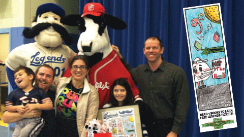 "Hit the Books" contest winner Maya Chamberlain, a student at Liberty Elementary School in Lexington, held her framed poster as she celebrated with her family, along with the Legends' Big L and the Chick-fil-A cow. At right is a photo of her winning entry. 
