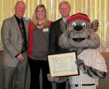  left to right: Steve Kunsey (Rock Cats), Amy Helbling (Rock Cats), Jason Howey (Okay Industries), and Rocky the Rock Cat 