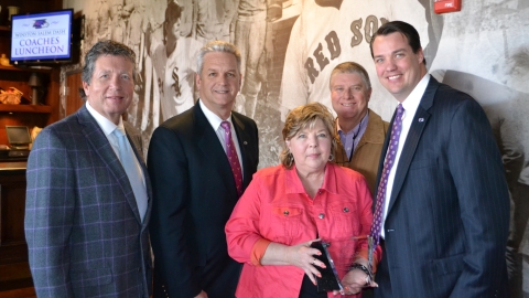 Judy Brenner (middle) accepted the Dash's Service Through Sports Award on behalf of her late husband Rich Tuesday afternoon. (Erik Weasenforth/W-S Dash)