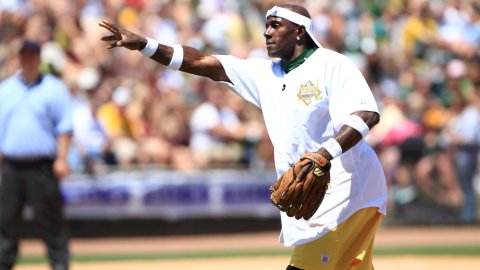 Donald Driver pitches during his 2012 Charity Softball Game. (Ann Mollica/Wisconsin Timber Rattlers)