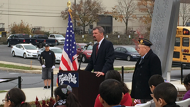 Fightins General Manager Scott Hunsicker made the announcement regarding the Ceremonial Flag Service now honoring World War II veterans at the Veterans Day Ceremony.
