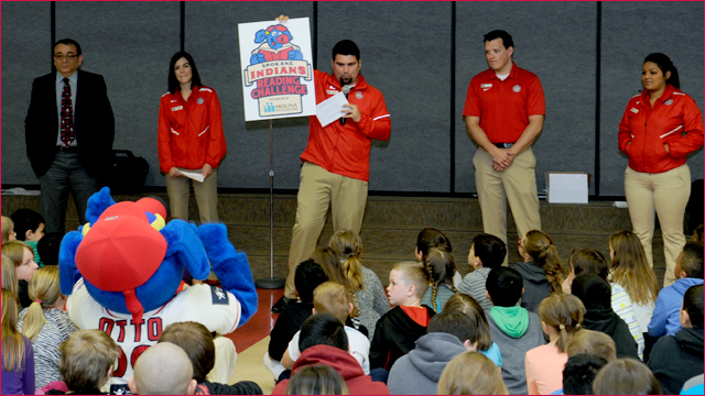 The Spokane Indians Front Office Staff inform children and OTTO the Mascot about the Reading Challenge presented by Molina Healthcare. (James Snook)